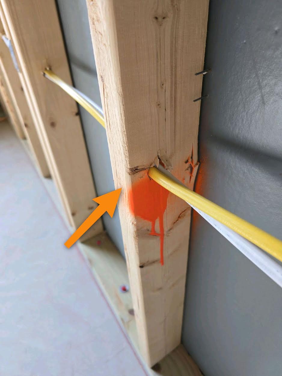 Electrical wiring run through a stud with no protective nail plate, found at pre-drywall in Prosper, TX