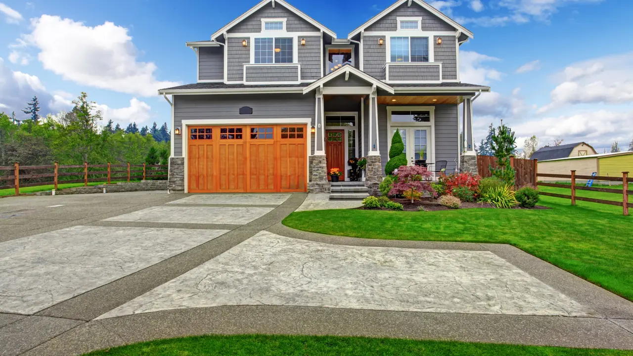 Two-story home with an attached garage, the kind of North Texas property RTI inspects